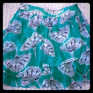 Green floral print mini skirt